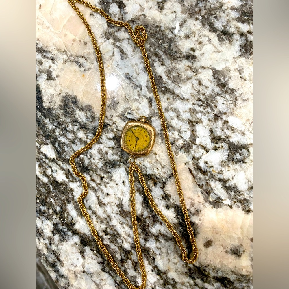 Vintage Gold Watch on a gold braided necklace